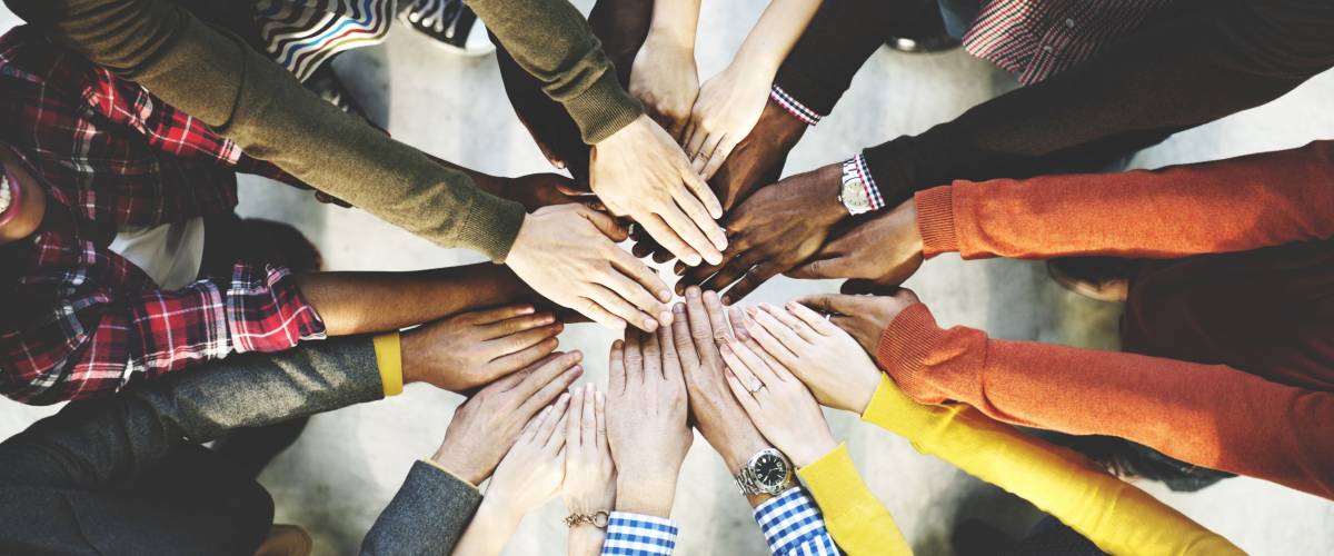 Group of Diverse Hands Together Joining Concept