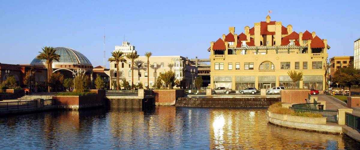 Waterfront Cityscape of All American City Award Recipient, Stockton, California, Reflected in River at Weber Point