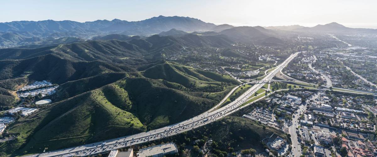 Aerial view of Ventura 101 freeway and suburban Thousand Oaks near Los Angeles, California.
