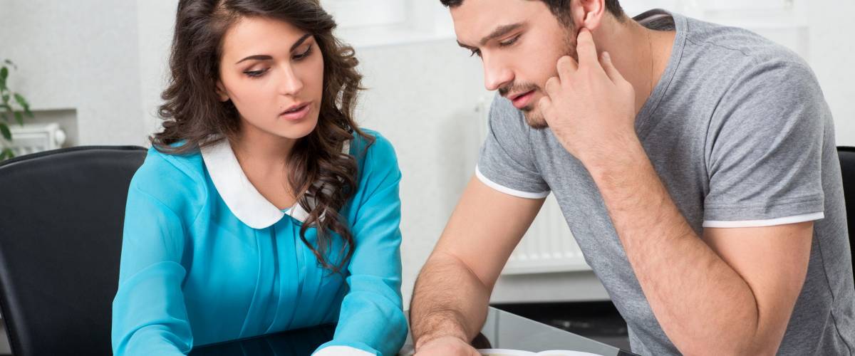Young man meets with financial planner