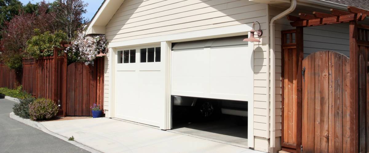 Open garage door in suburban house
