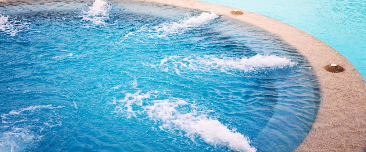 Outdoor Jacuzzi Pool with Fresh Blue Water for Massage and Spa
