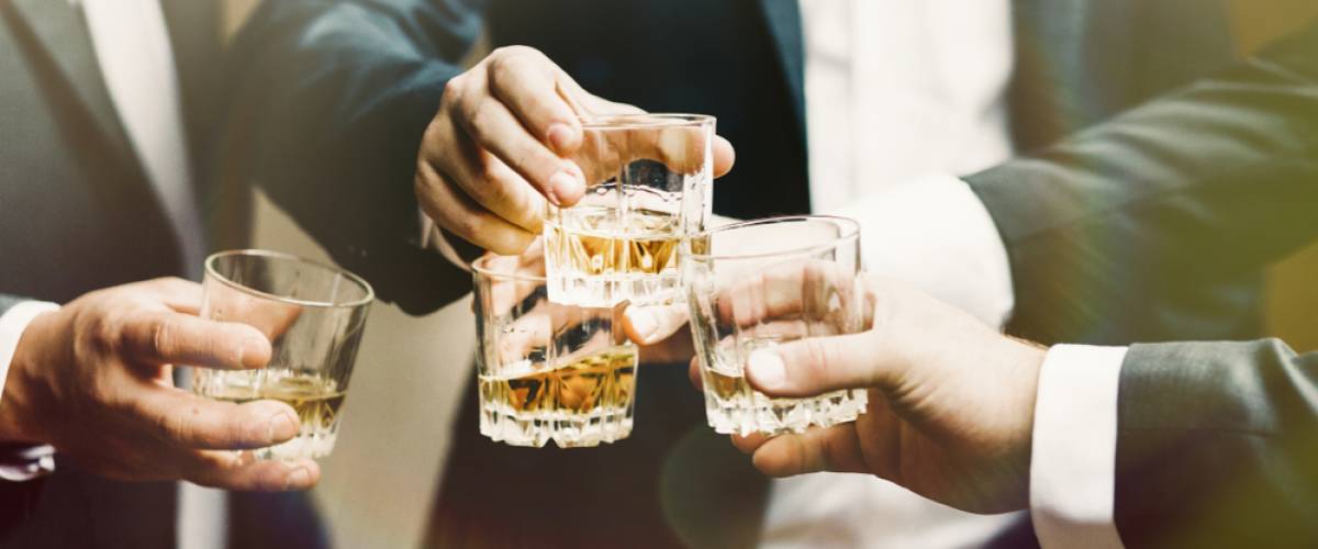 men cheers scotch