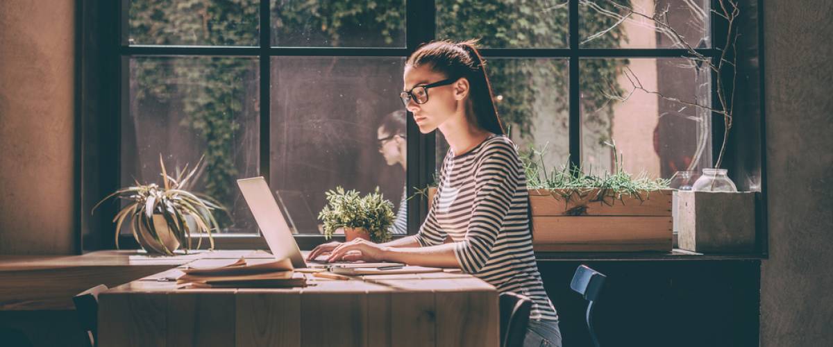 woman working on laptop concentration
