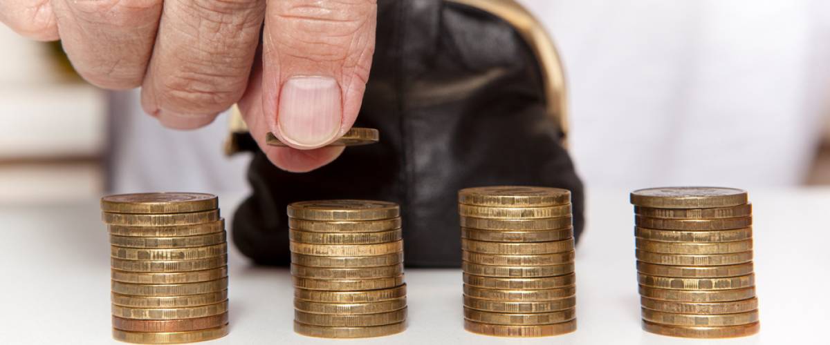 man counting coins