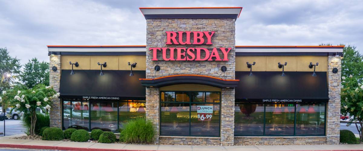 Loganville, GA - July 13th 2019: Ruby Tuesday store front sign - American franchise - location located in Georgia off of highway 78. Chain restaurant offers full all you can eat salad bar.