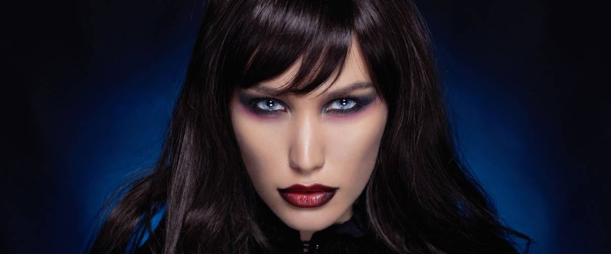 beautiful young vampire woman.black haired sexy halloween girl