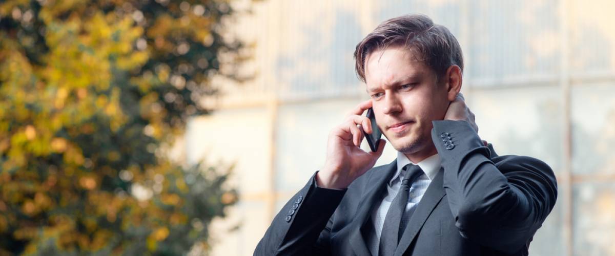 businessman on phone serious