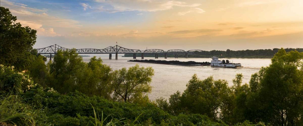 A pusher boat in the Mississippi River near the Vicksburg Bridge in Vicksburg, Mississippi, USA.