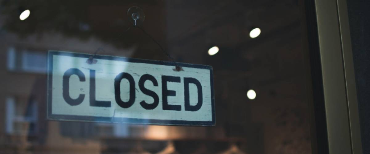 Closed sign on window