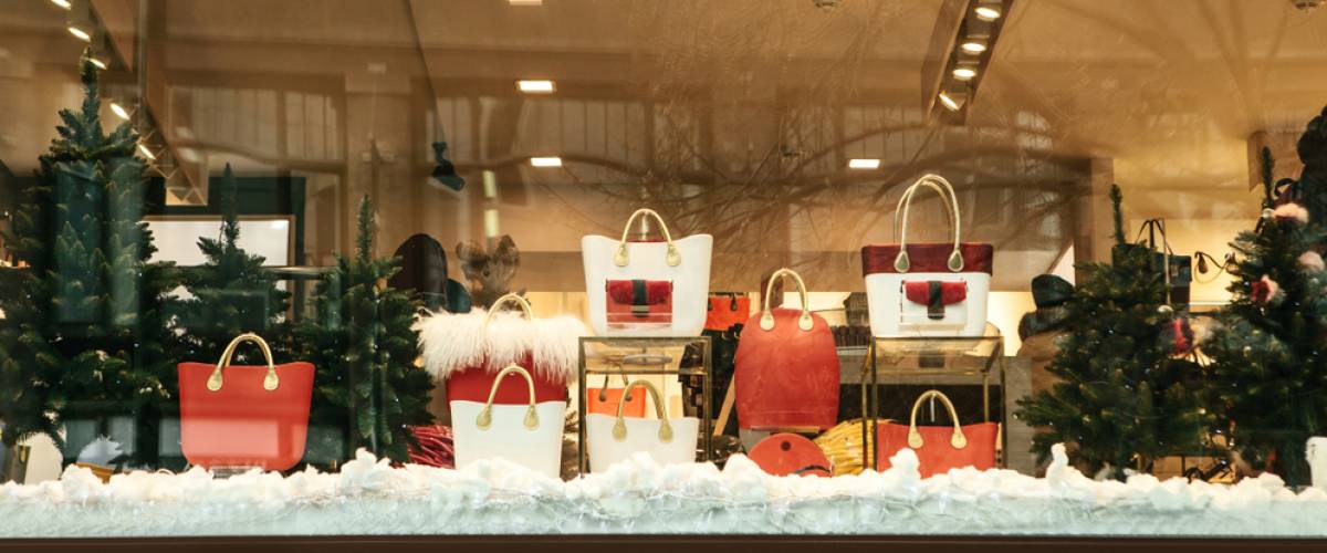 Store window decorated with Christmas gifts