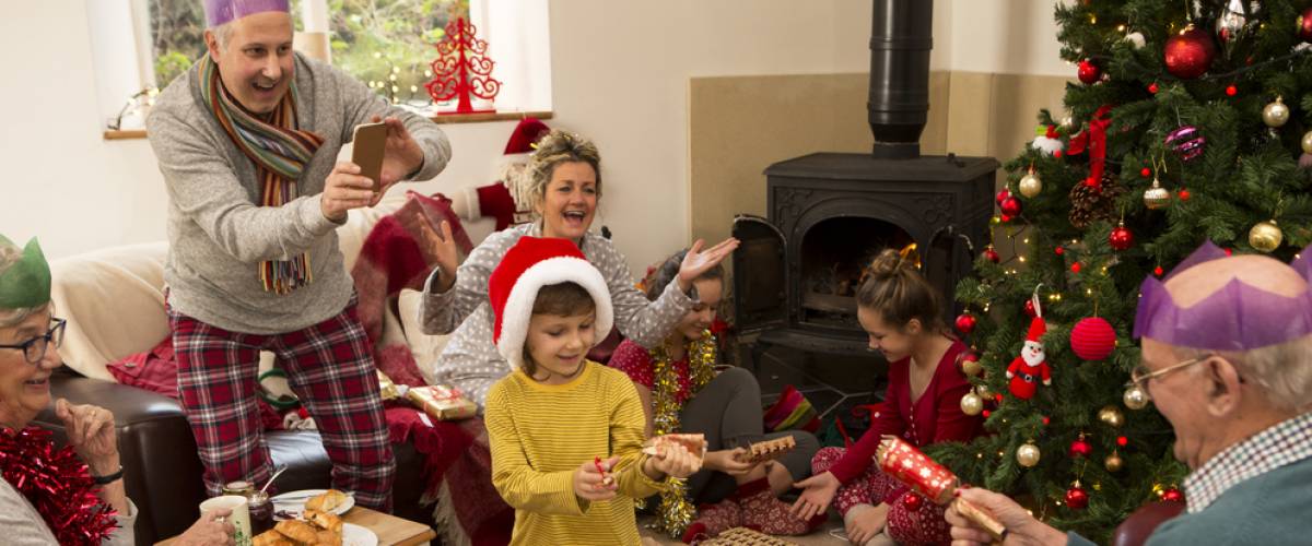 Family sitting in living room