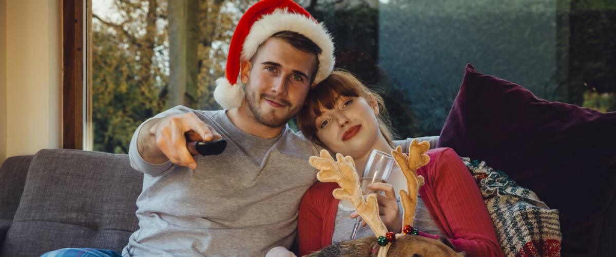 Couple watching a movie on couch