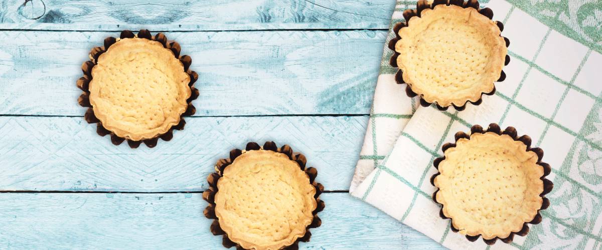 pie shells on a table