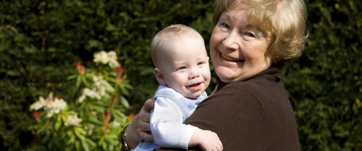 Grandmother holding grandson