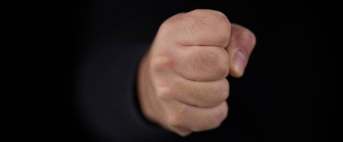 Man with his hand in a fist