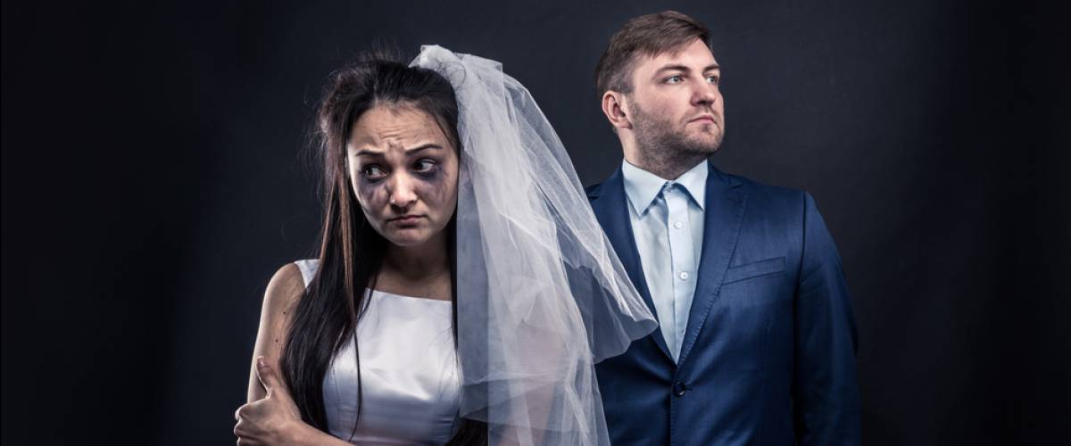 Crying bride and unhappy groom
