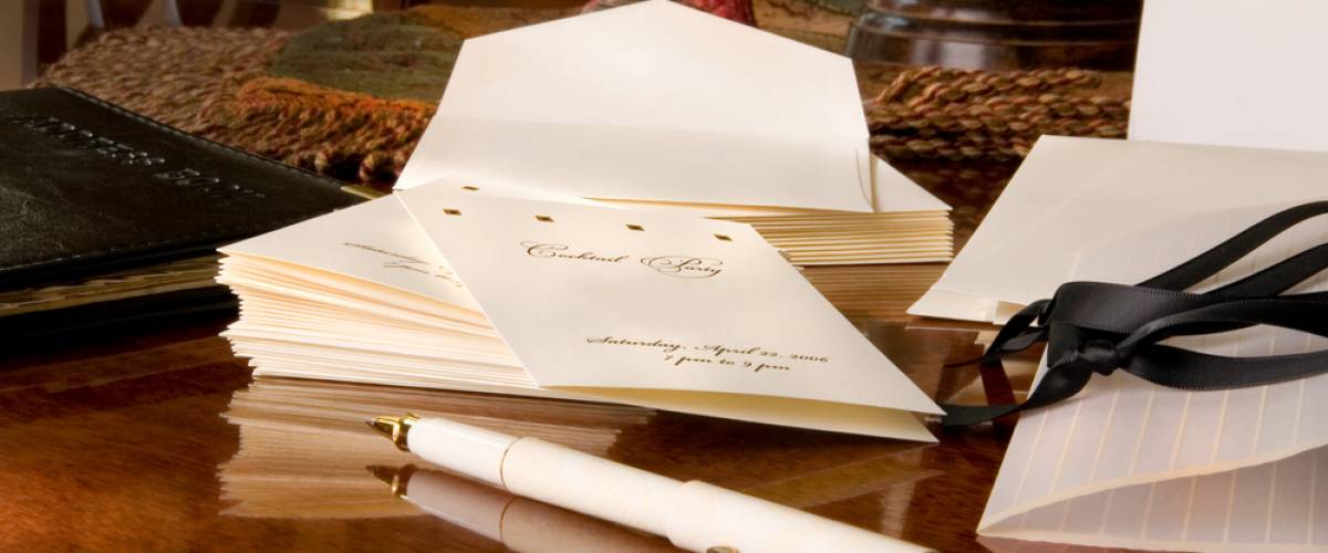 Wedding invitations being written and mailed