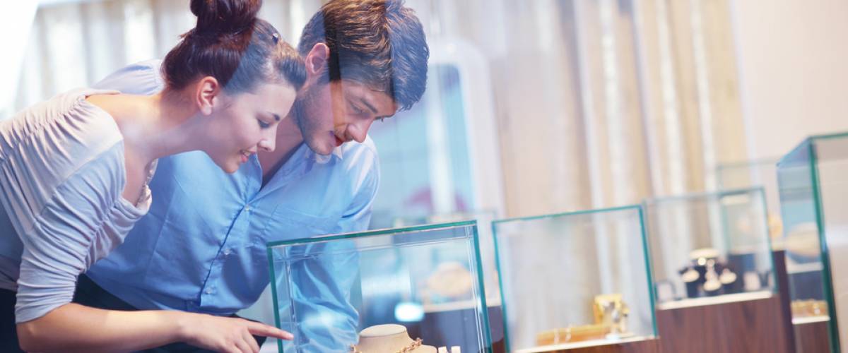 Couple looking at jewelry