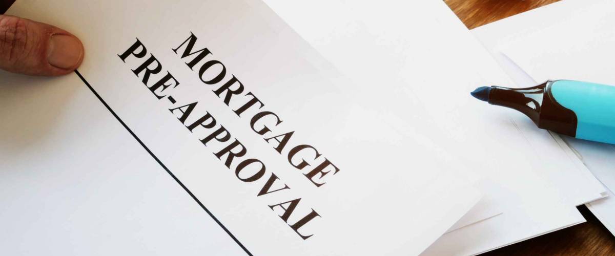 Mortgage pre-approval documents in the office.