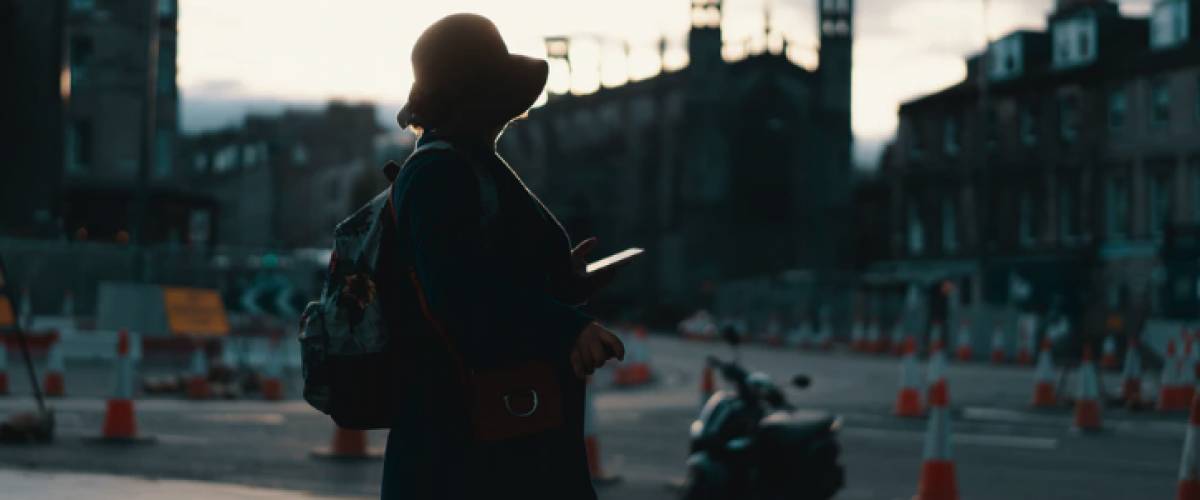 Woman travelling, looking for directions