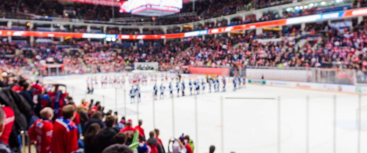 Defocused and blur background of the sport arena with ice hockey, olympic games