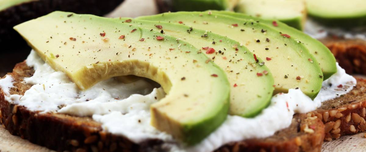 sliced avocado on toast bread with spices