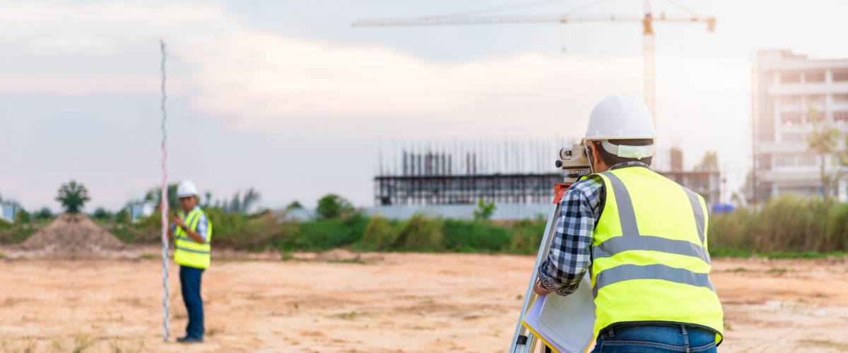 Surveyor equipment. Surveyor’s telescope at construction site or Surveying for making contour plans are a graphical representation of the lay of the land before startup construction work