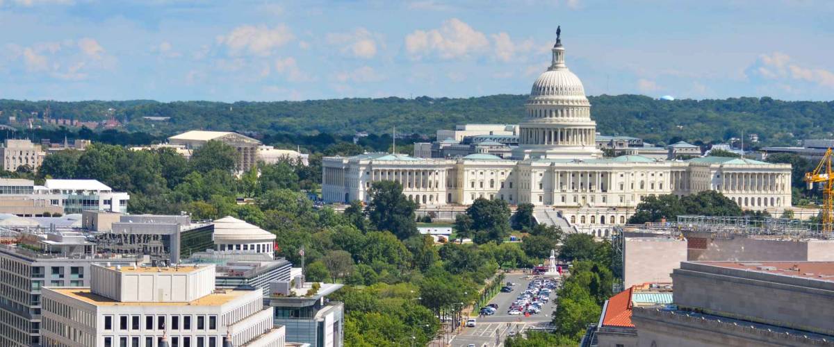 Washington DC - Aerial view of Pennsylvania street with federal buildings including US Archives building, Department of Justice and US Capitol