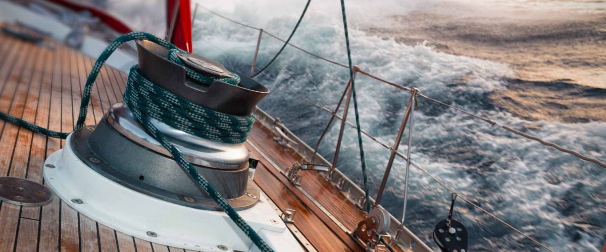sail boat under the storm, detail on the winch