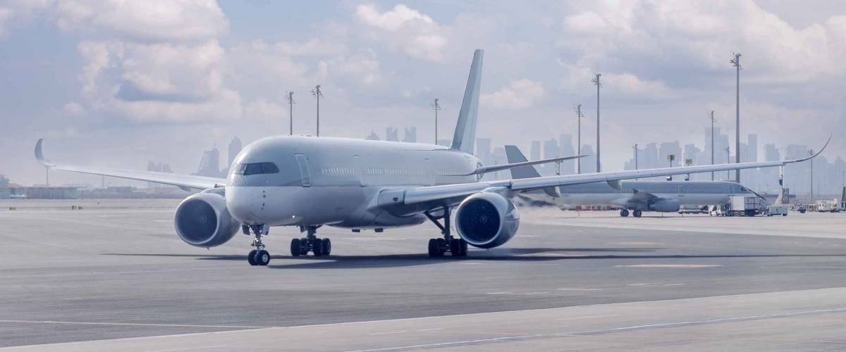 Passenger plane on airport parking. Copy space.