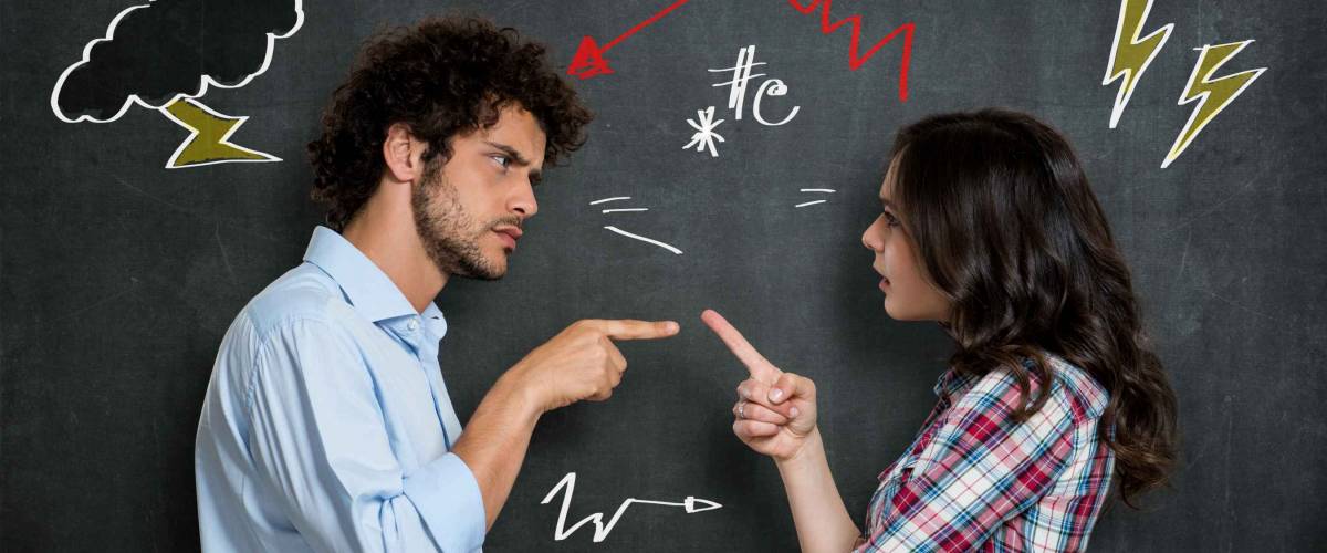 Discussion Between Guy And Girl Over Gray Background