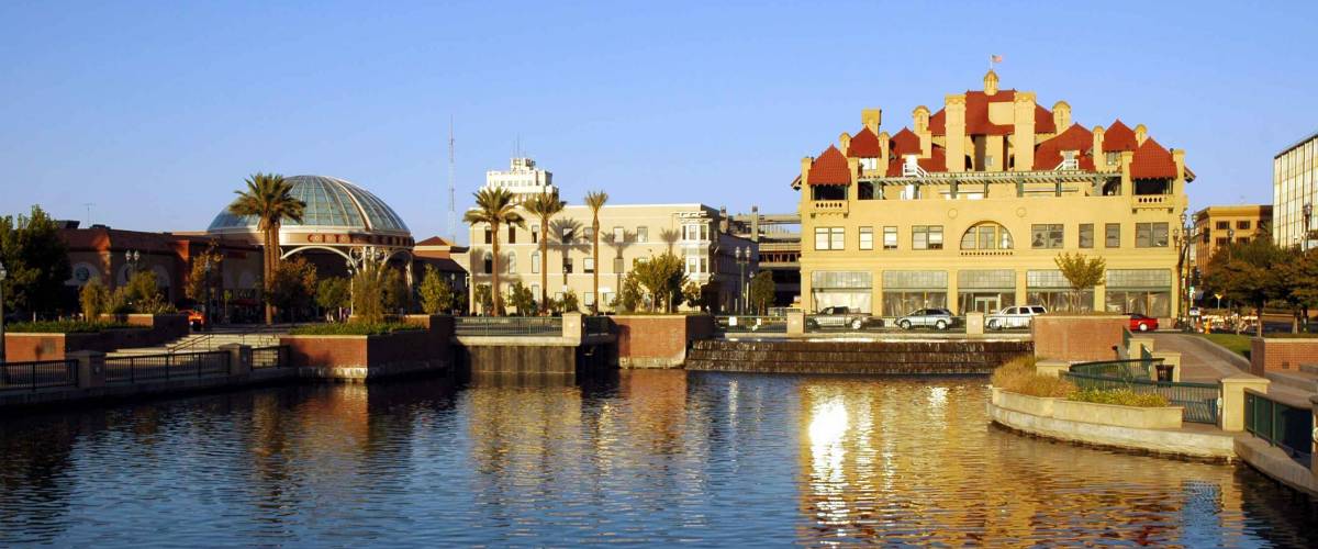 Waterfront Cityscape of All American City Award Recipient, Stockton, California, Reflected in River at Weber Point