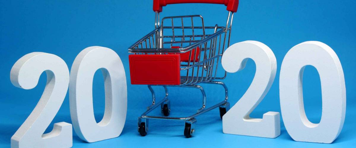 Shopping Cart isolated blue background with happy new year 2020 - Business Shopping stores to buy goods concept