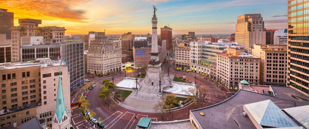Indianapolis, Indiana, USA skyline over Soliders' and Sailors' Monument at dusk.
