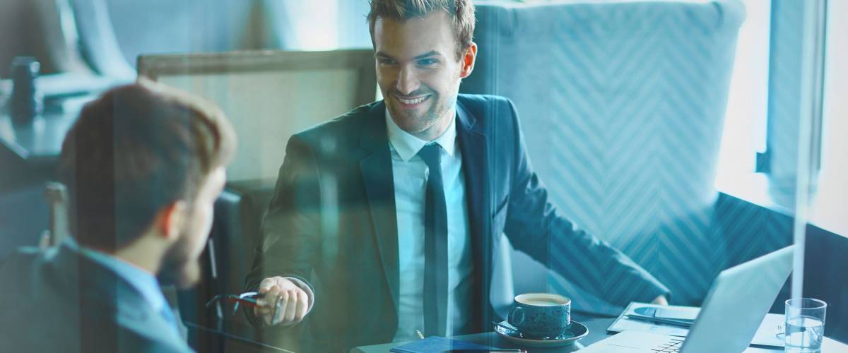 Young businessman voicing his ideas or plans