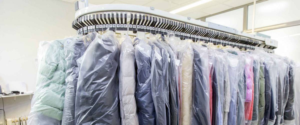 Clothes after dry cleaning in the laundry