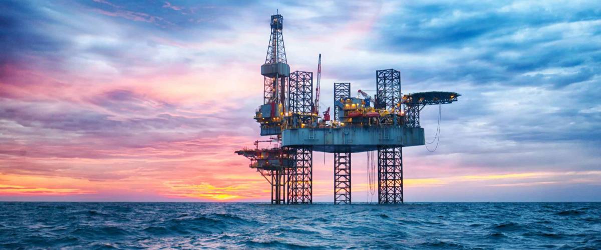 HDR of Offshore Jack Up Rig in The Middle of The Sea at Sunset Time