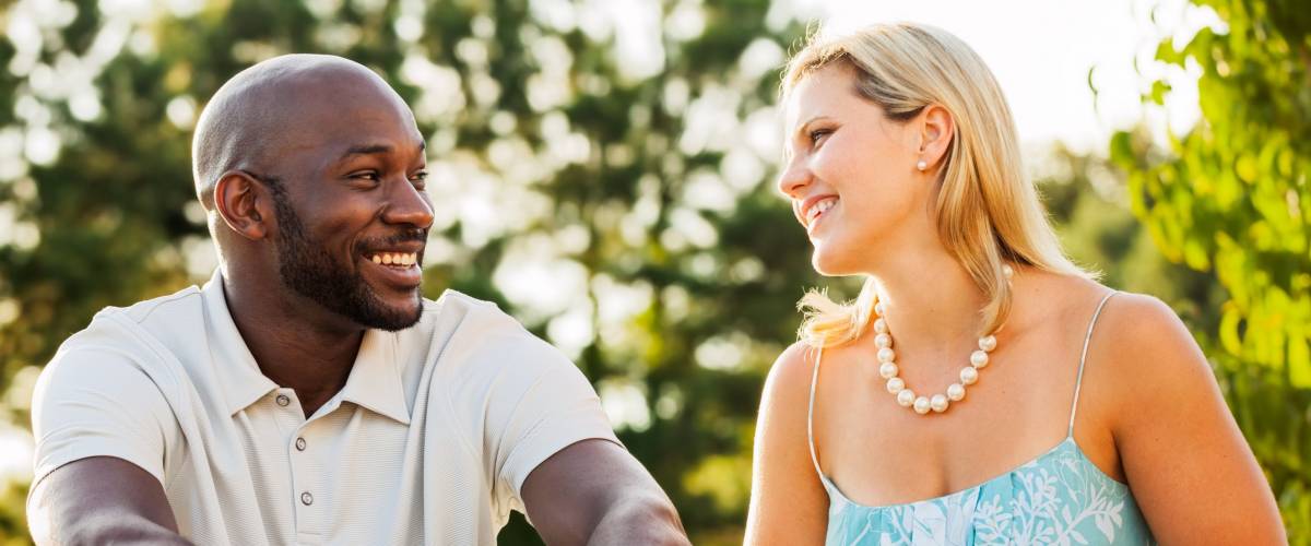 talking to each other at a park on a summer day