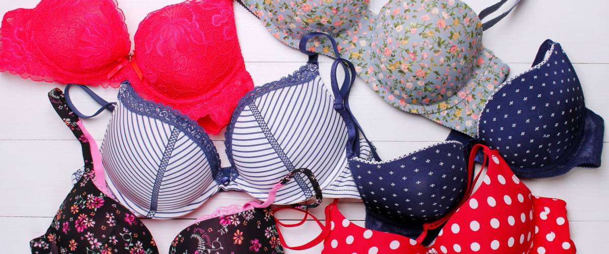 beautiful sexy bras on a wooden background