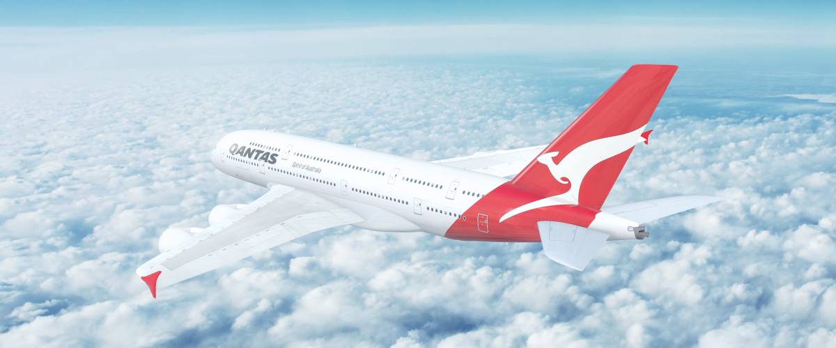 Qantas airplane flying in the air.