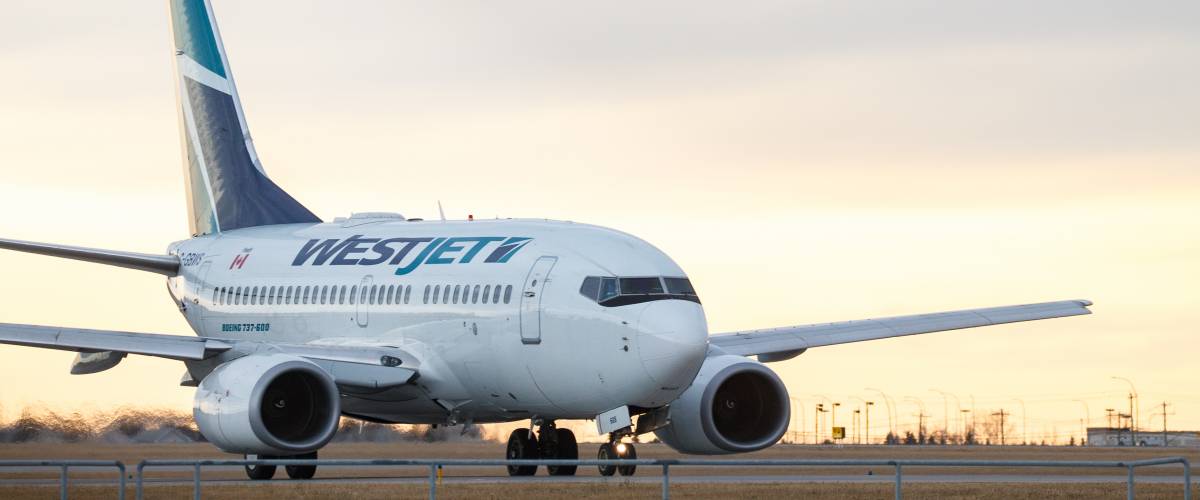 WestJet airplane on the tarmac.