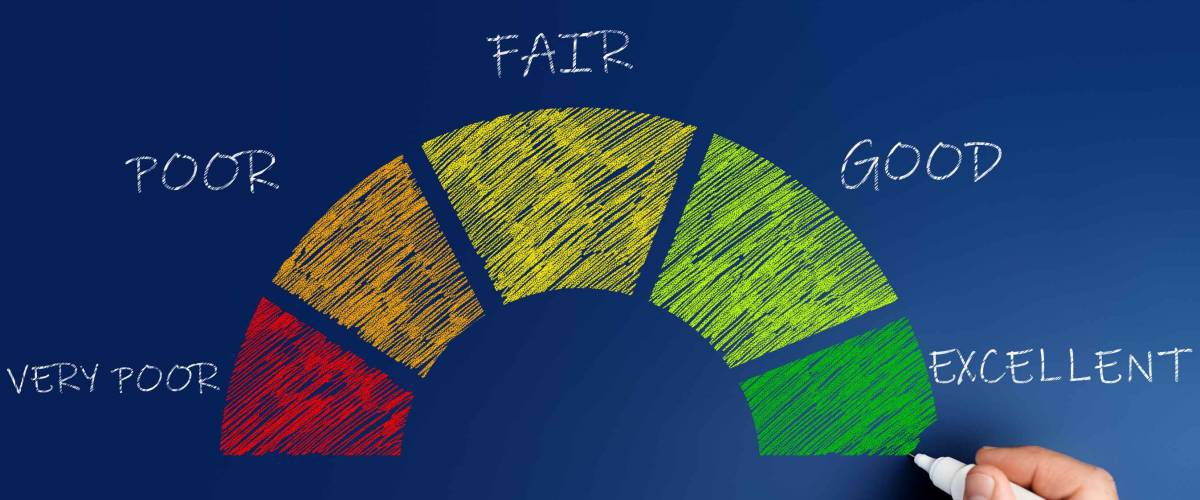 credit score concept, male hand draws a chart with credit history values.
