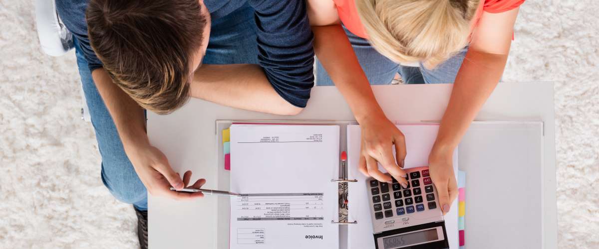 concept couple saving calculating bills