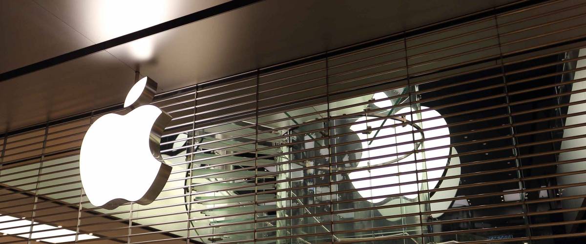 Hong Kong, China - October 4, 2018: Closed after work day an Apple flagship store. Chain of retail stores owned and operated by Apple Inc. Low light at night, selective focus