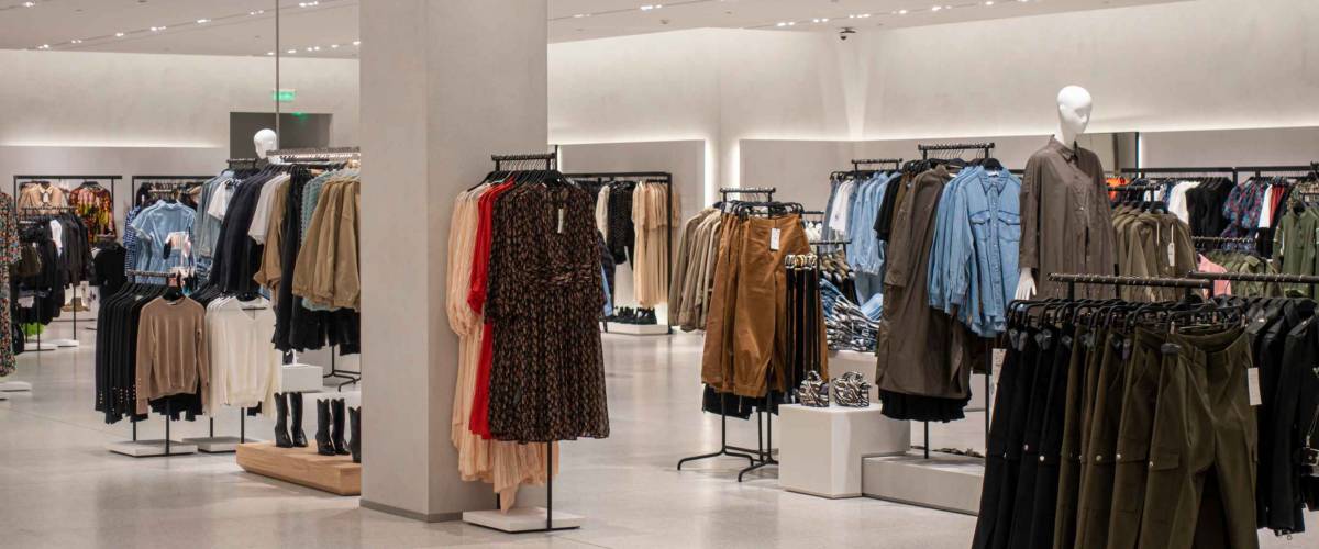 Modern fashionable brand interior of clothing store inside shopping center