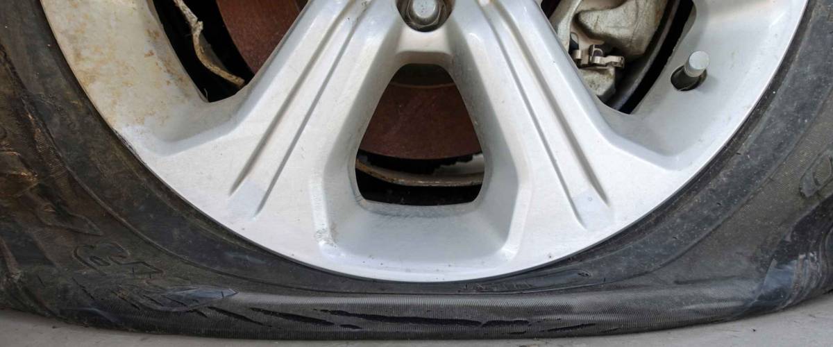 Closeup for car flat tire