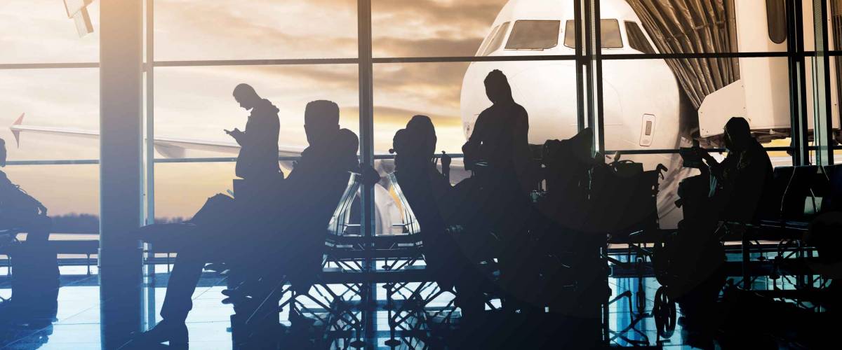 Passengers waiting at gate terminal in Airport