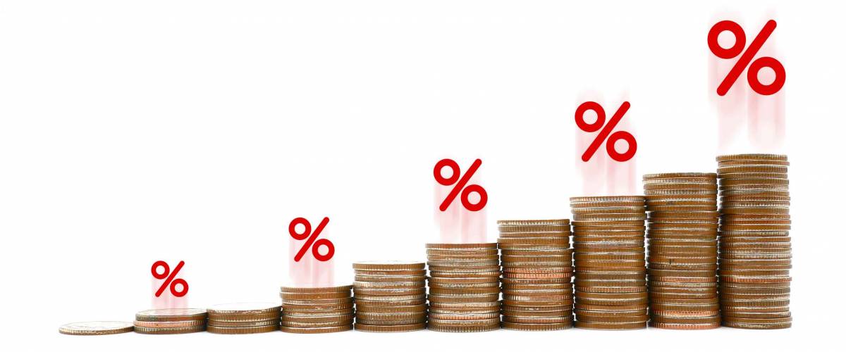 Coin stack step up graph with red colour percent icon isolated on white background, Risk management business financial and managing investment percentage increase interest rates concept
