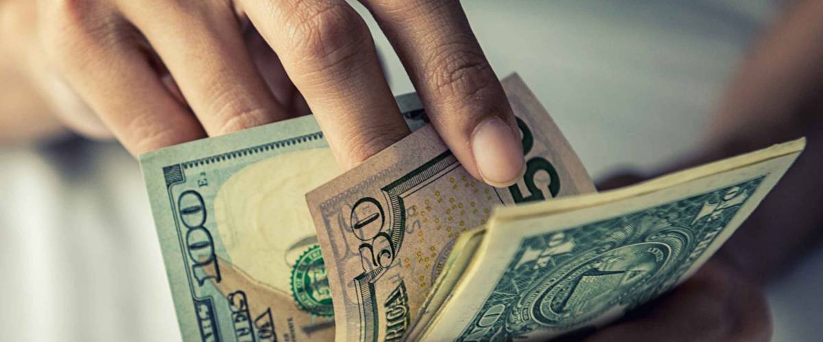 Close-up Hands counting money American dollars
